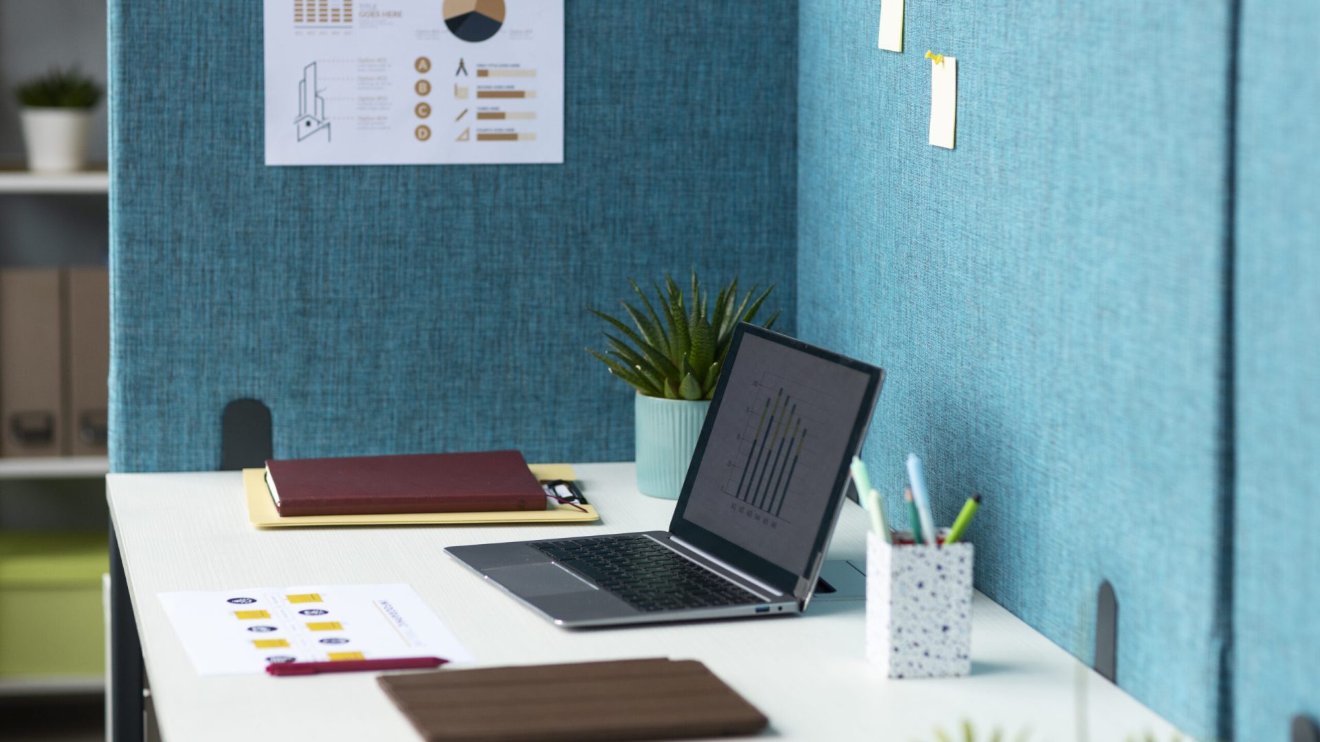 office-arrangement-with-partitions-laptop